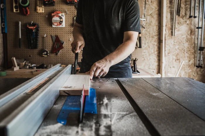 cutting-wood-on-workbench